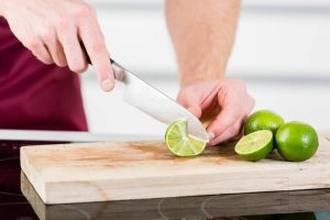 Cutting fruits with Paring Knife on a cutting board