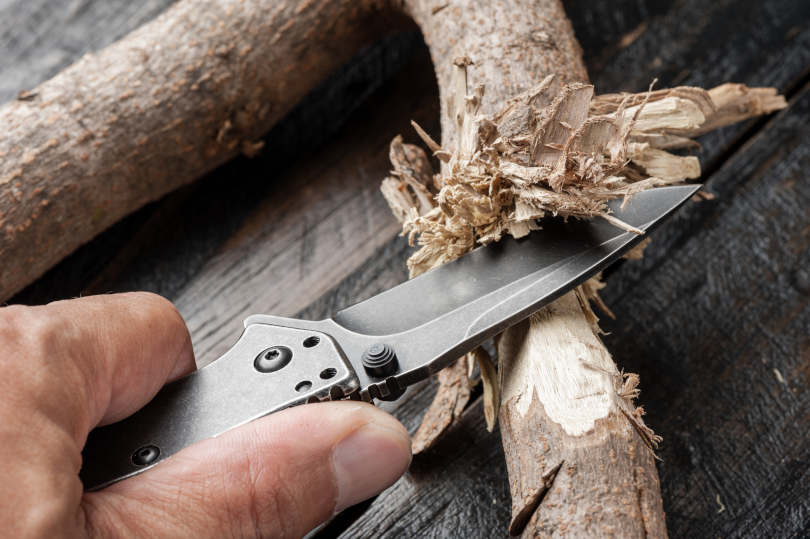 Stainless steel pocket knife with blackwash finish on blade and handle