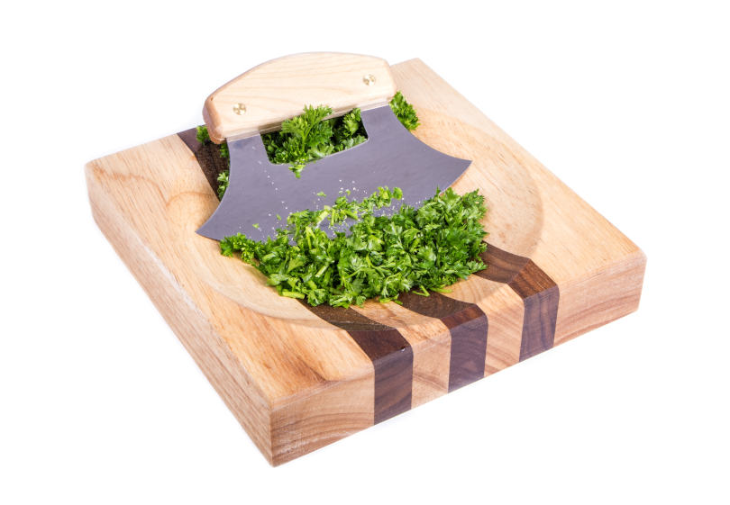 Chef cut vegetables with an ulu knife