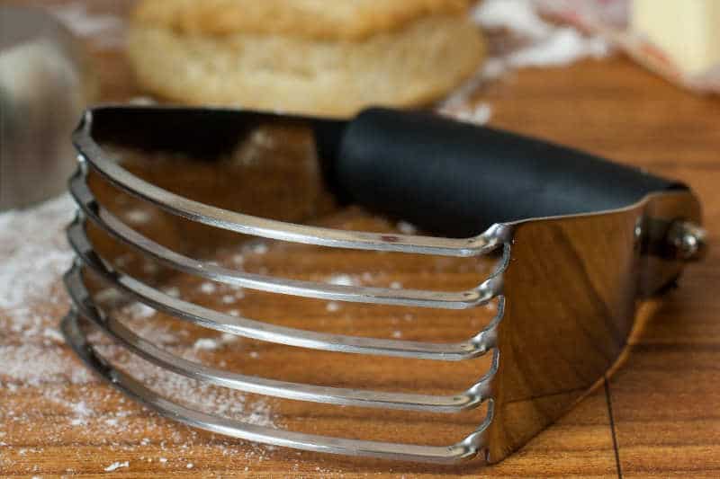 Pastry cutter with pastry on the board